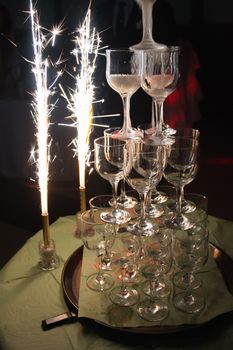 waiters poured into glasses of wine and champagne.