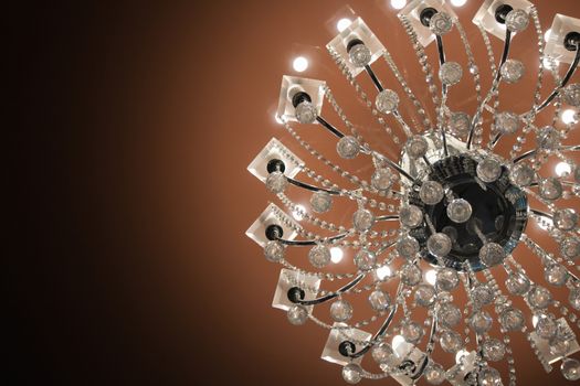 Close up on crystal of contemporary chandelier.