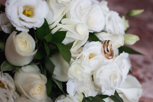 Beautiful wedding bouquet and Beautiful wedding rings.