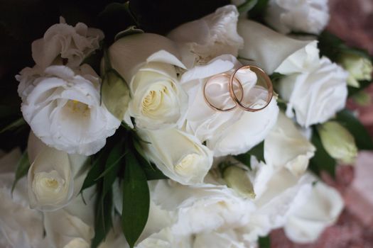 Beautiful wedding bouquet and Beautiful wedding rings.