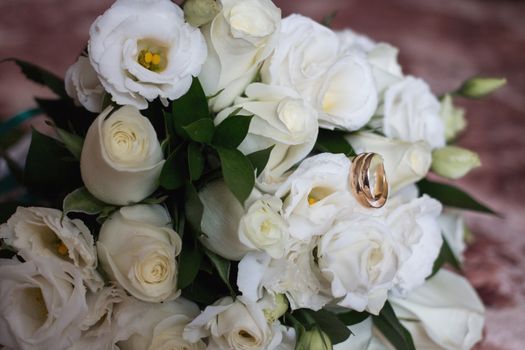 Beautiful wedding bouquet and Beautiful wedding rings.