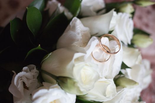 Beautiful wedding bouquet and Beautiful wedding rings.