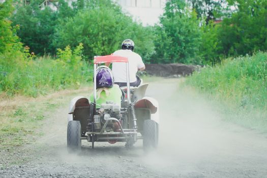 Man driving off-road with quad bike or ATV.