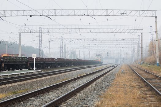 Railroad workers maintaing railways. checking construction