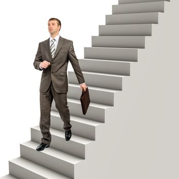 Businessman in formal wear walking down steps over white background