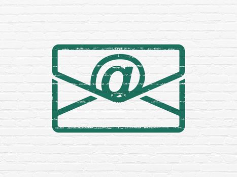 Business concept: Painted green Email icon on White Brick wall background