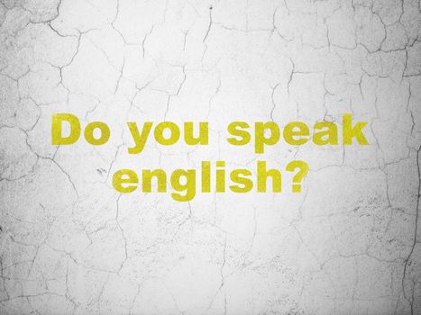 Studying concept: Yellow Do you speak English? on textured concrete wall background