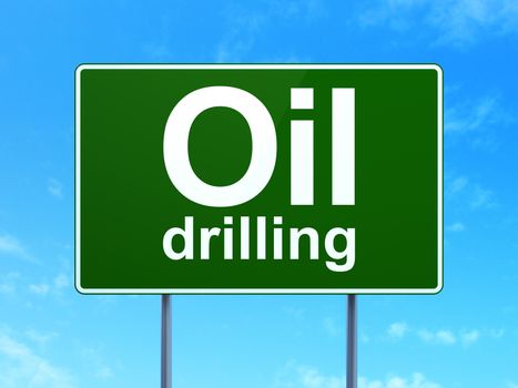 Manufacuring concept: Oil Drilling on green road highway sign, clear blue sky background, 3D rendering