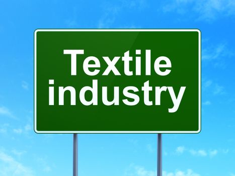 Industry concept: Textile Industry on green road highway sign, clear blue sky background, 3D rendering