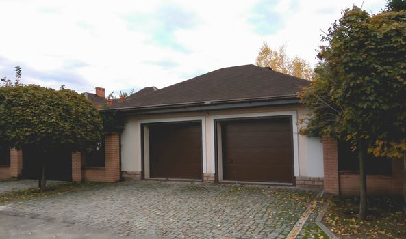 Close-up of modern detached house with garage