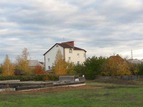 Large private house with a green lawn