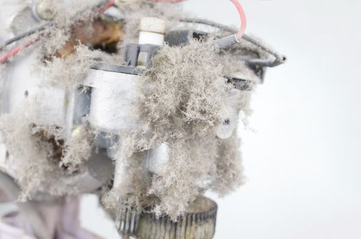 Close up dust on motor electric fan with white background and copy space. Maintenance and healthy concept photography.