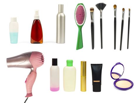 Set for makeup on white background. Hairdryer, brushes, hairbrush, mirror and other