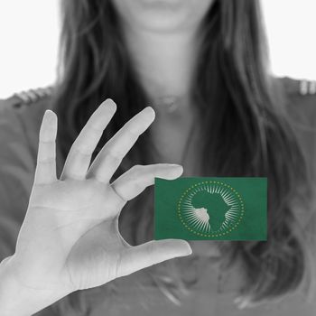 Businesswoman showing a business card - African Union