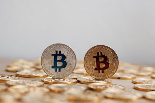 Digital currency physical bitcoin coin. Gold background coins concept.