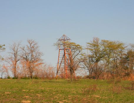 a life-saving wooden tower on the river bank