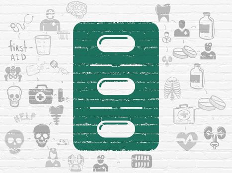 Medicine concept: Painted green Pills Blister icon on White Brick wall background with Scheme Of Hand Drawn Medicine Icons