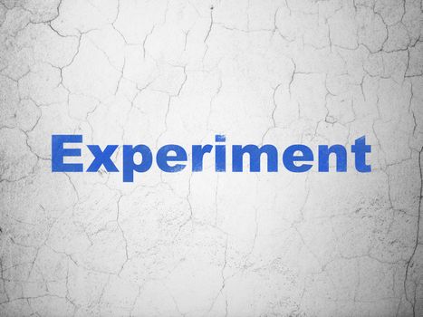 Science concept: Blue Experiment on textured concrete wall background