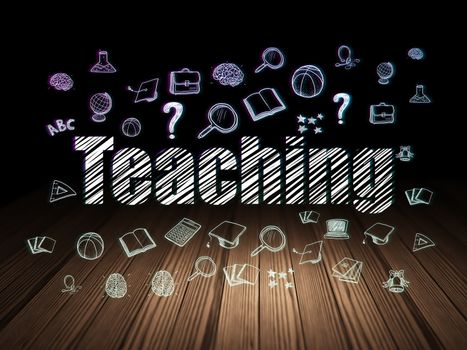 Education concept: Glowing text Teaching,  Hand Drawn Education Icons in grunge dark room with Wooden Floor, black background