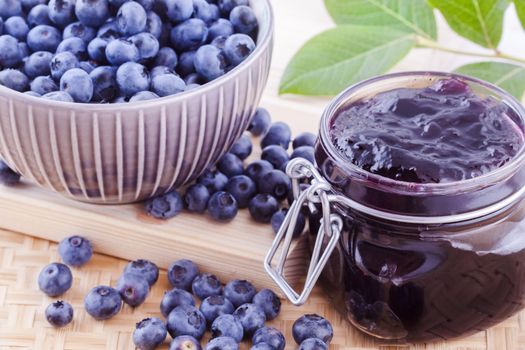 Blueberry fruits jam in the kitchen on the table