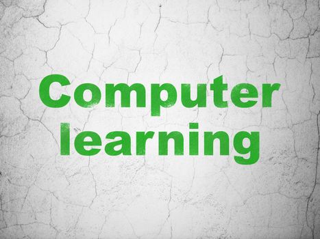 Studying concept: Green Computer Learning on textured concrete wall background