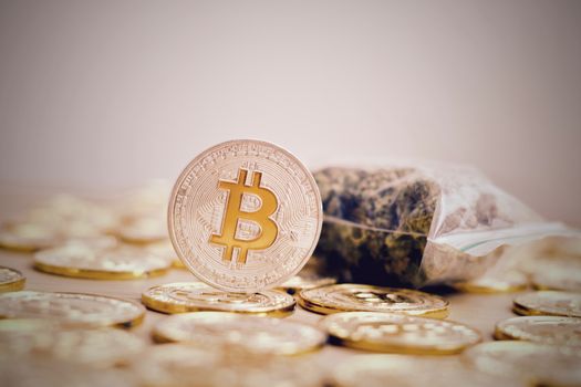 Digital currency physical bitcoin coin. Gold background coins concept.