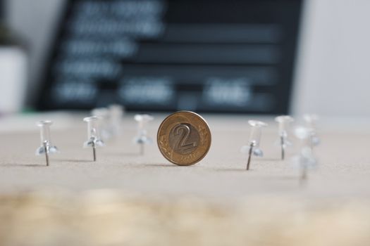 Physical polish coin near cinema board. Polish money lifestyle concept.