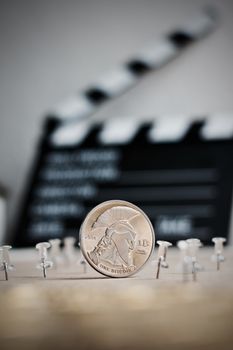 Digital currency physical metal bitcoin coin. Cryptocurrency cinema concept.