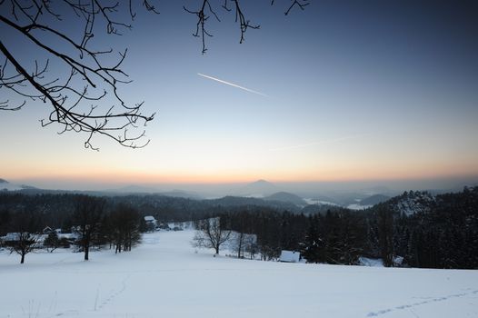 Winter panorama in the Czech Switzerland with snow and frost