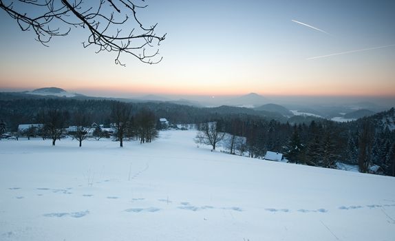 Winter panorama in the Czech Switzerland with snow and frost