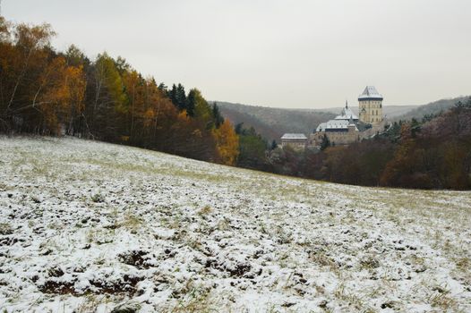 View of a snowy winter landscape with a castle Karlstejn