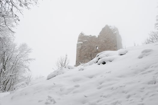 Snow and frost in the evening at the ruins