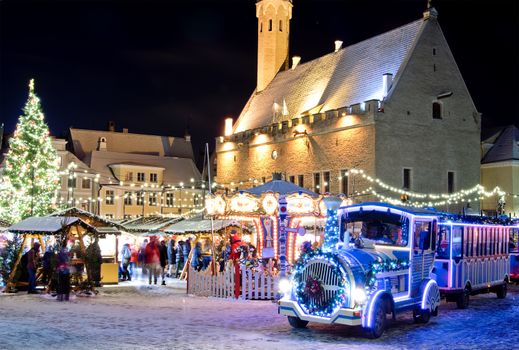 Christmas train near christmas market in old city of  Tallinn, Estonia