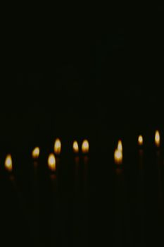 Artistic abstract blur background with church candles