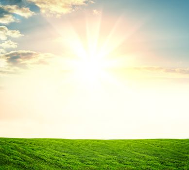 Landscape Of Green Field Under Summer Sunset Or Sunrise. Skyline