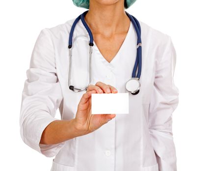 Closeup shot of an empty white card in a hand of doctor or nurse, isolated on white background