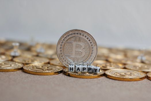 Digital currency physical metal bitcoin coin on the christmas concept.