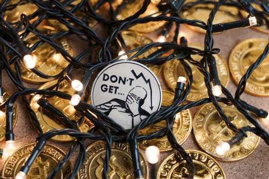 Digital currency physical metal bitcoin coin on the christmas concept.