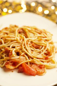 Italian tasty and fresh pasta on white plate. Christmas food concept.
