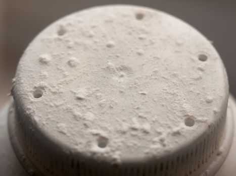 close up of talcum powder bottle top dirty white; essex; england; uk