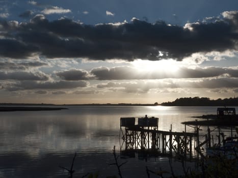 beautiful landscape open water ocean sea top surface sunset dramatic clouds; essex; england; uk