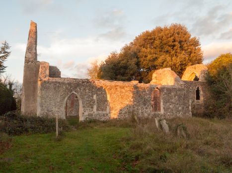 old ruined abandoned church outside alresford sunset bricks stones; essex; england; uk