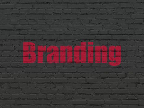 Advertising concept: Painted red text Branding on Black Brick wall background