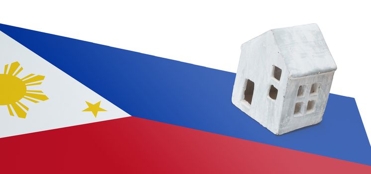 Small house on a flag - Living or migrating to Philippines