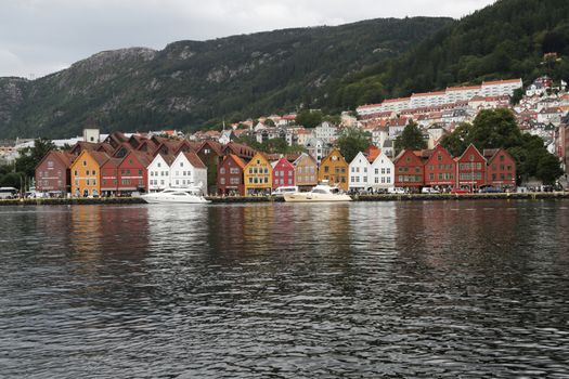 Famous Bryggen street with wooden colored houses in Bergen