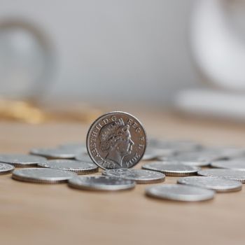 Silver british coin - 10p. Pound sterling money concept. British currency.
