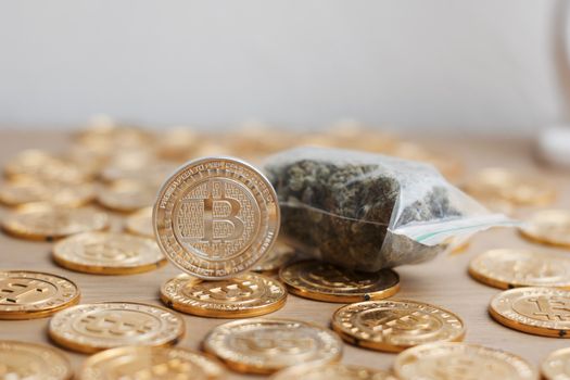 Digital currency physical bitcoin coin. Gold background coins concept.