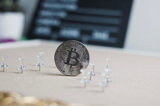 Digital currency physical metal bitcoin coin. Cryptocurrency cinema concept.