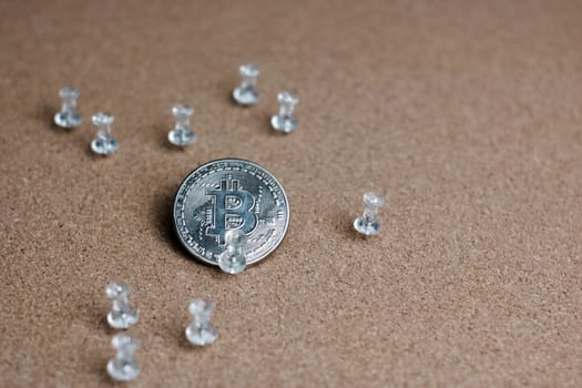 Digital currency physical metal bitcoin coin. Cryptocurrency cinema concept.