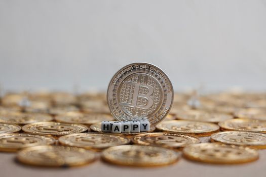 Digital currency physical metal bitcoin coin on the christmas concept.